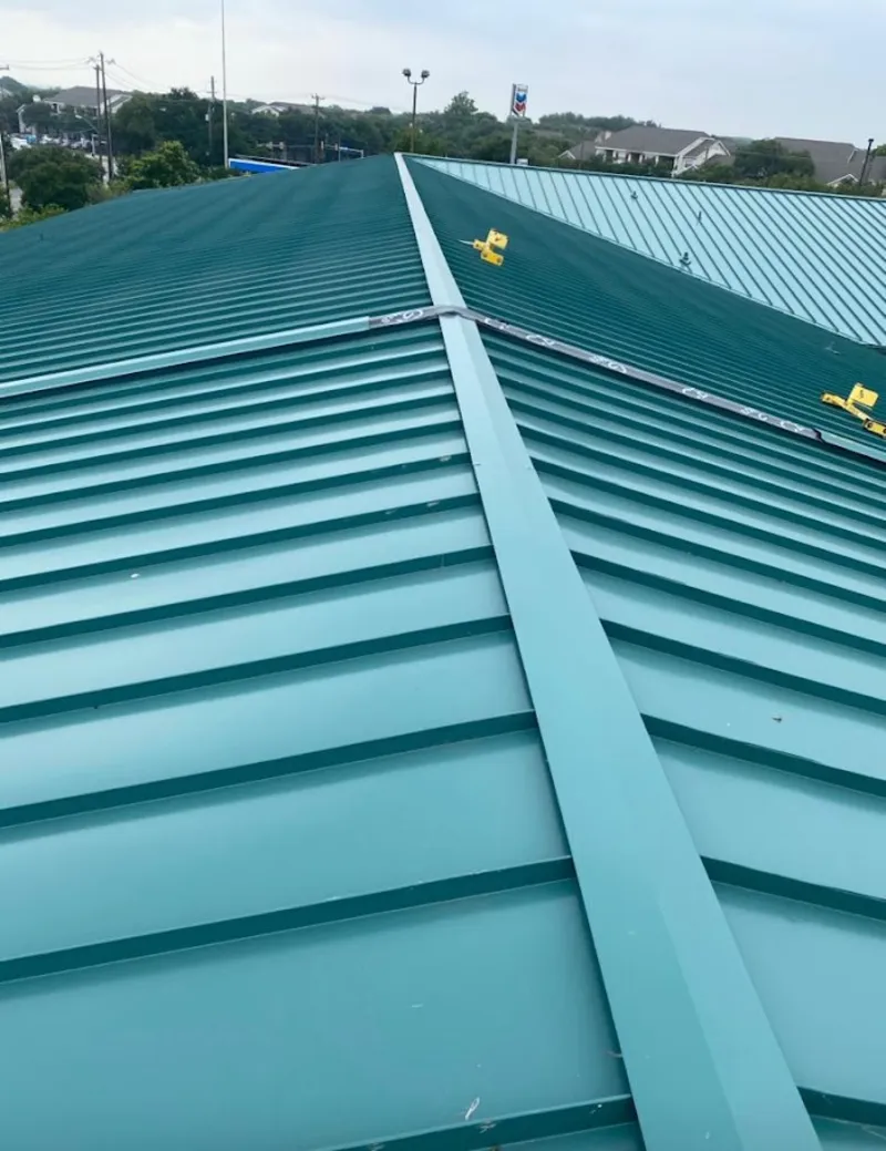 Green commercial metal roof ridge and valley for Metal Roof Repair in Agawam Town